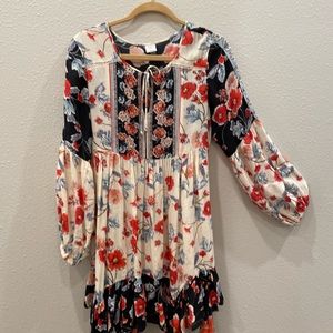 Adorable piece that is versatile- wear as tunic or dress. Dress up or down.